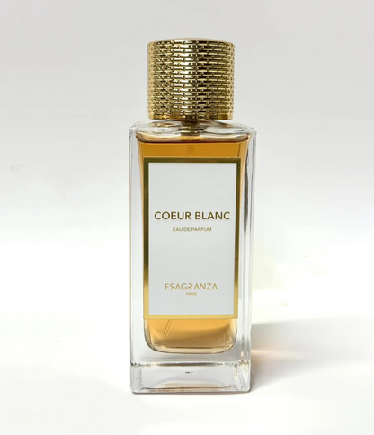 Flacon de parfum Fragranza Cœur Blanc, eau de parfum unisexe, élégant flacon en verre transparent avec détails argentés, notes florales et fraîches, idéal pour un usage quotidien."